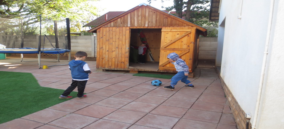 Kids playing Soccer oustide