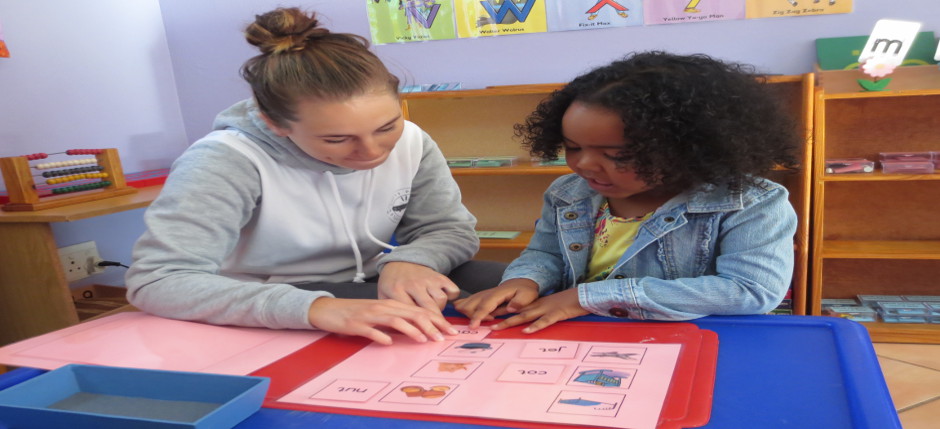 Teacher and kid learning